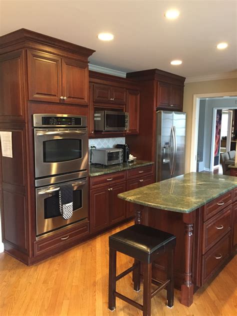 cherry wood cabinets with stainless steel appliances|cherry kitchen cabinets cost.